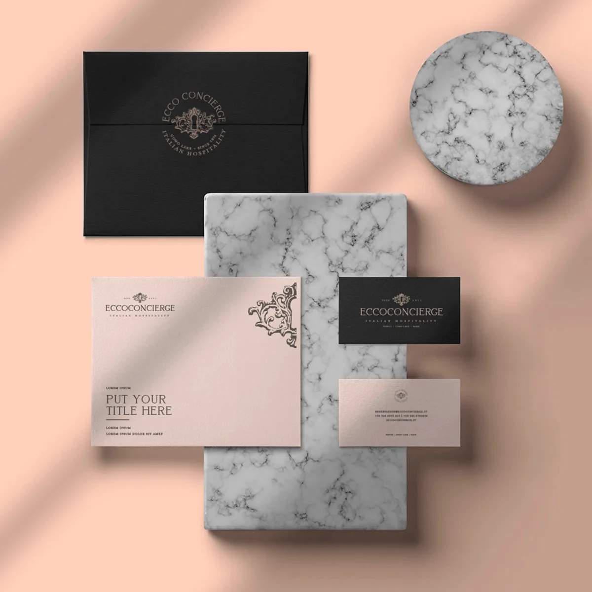 Biglietti da visita e carta intestata Ecco Concierge su marmo